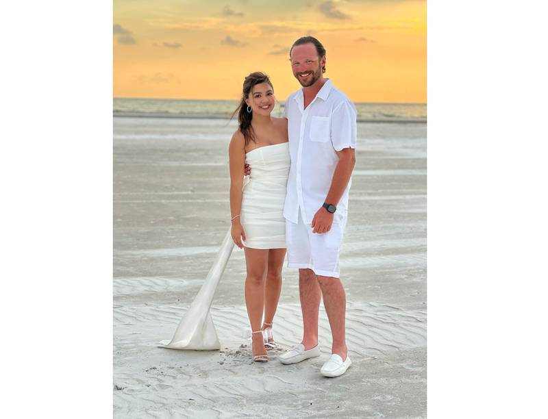 Cristina and Nicky Altiery of Shorewood had planned the perfect wedding for Saturday, Sept. 24, 2022, on Siesta Key Beach in Florida. But they cut their honeymoon plans short to avoid Hurricane Ian.