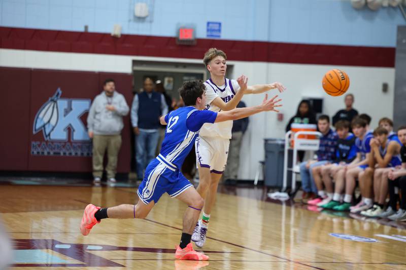 Manteno's Eric Eldridge passes the ball ahead of Peotone's Tyler Walker during the Panthers' 60-49 victory over Peotone in the 75th Kankakee Holiday Tournament opening round on Friday, Dec. 26, 2025.