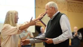 Ogle County Board honors two long-serving members, coroner