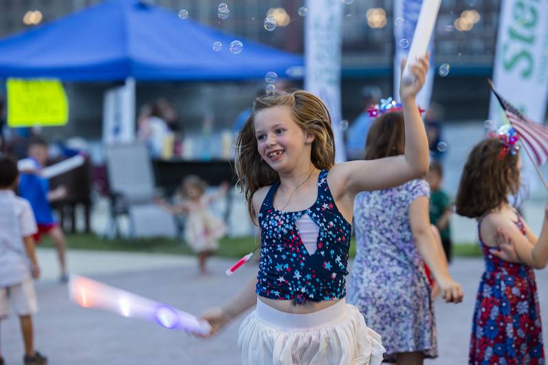 Children dance Thursday, July 3, 2025, to the music of Evergreen, during Rock Falls Tourism’s 4th of July celebration at RB&W Park. Music, food and of course fireworks kick off the weekend of American independence.