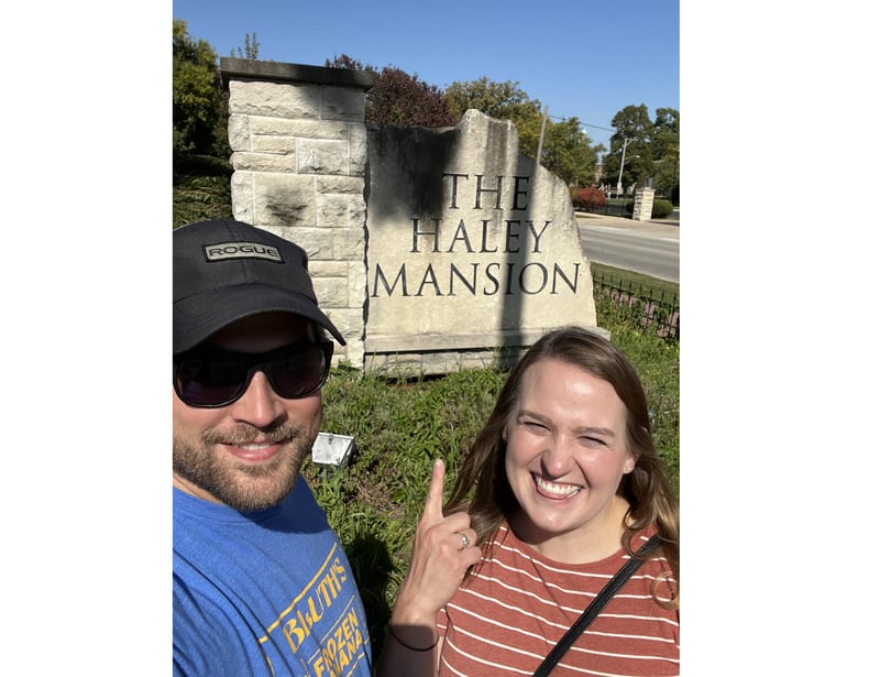 Amy Haller of Joliet (right) and her fiancé Craig McNeil of Joliet take a selfie in front of the historic Haley Mansion in Joliet in October 2022, the mansion where they are planning to host their wedding in November 2023.
