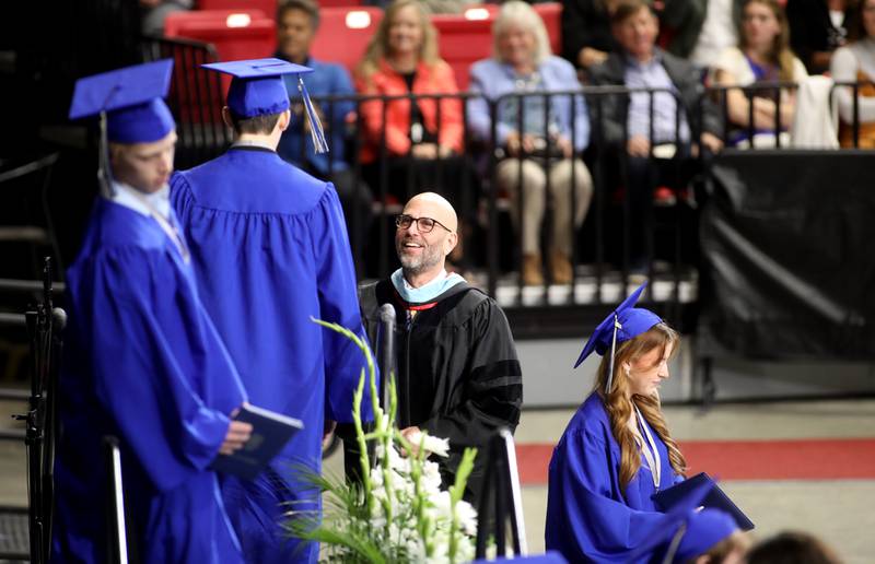 St. Charles Community Unit School District 303 Superintendent Paul Gordon congratulates students during the St. Charles North 2025 commencement ceremony on Thursday, May 22, 2025 at Northern Illinois University in DeKalb.