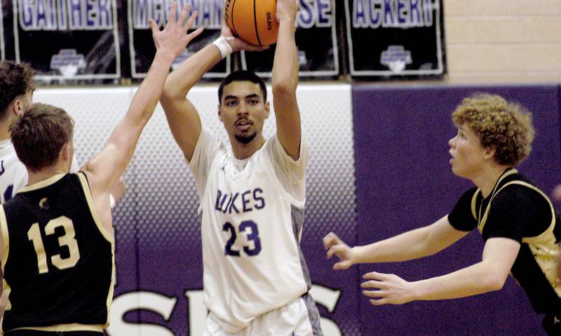Dixon's Zander Wilson looks to pass the ball up the court. The Dixon Dukes hosted  the Sycamore Spartans in a non-conference game  on Friday, December 19th, 2025.