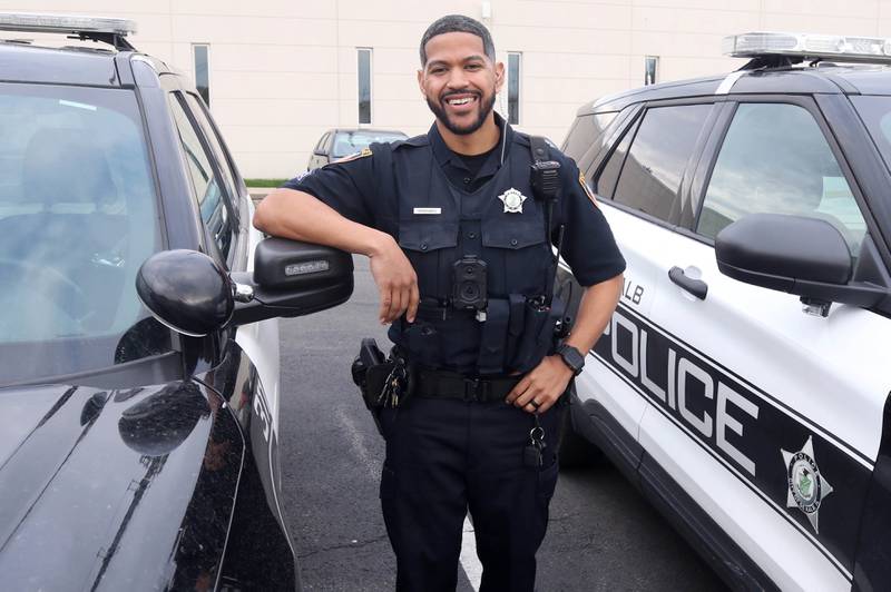 DeKalb Police Sgt. Raynaldo Hernandez prepares to start his shift Thursday, April 11, 2024, behind the DeKalb Police Department.