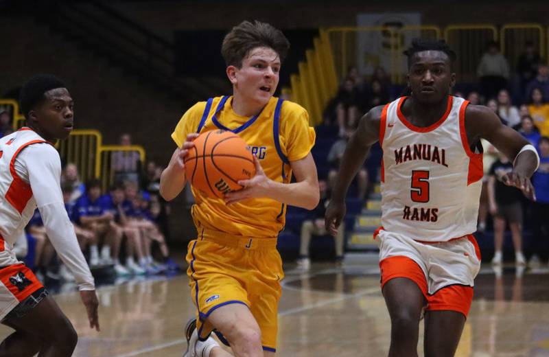 Johnsburg’s Trey Toussaint moves the ball against Peoria Manual in boys IHSA Class 2A Supersectional basketball on Monday, Mar. 9, 2026, at Sterling High School in Sterling.