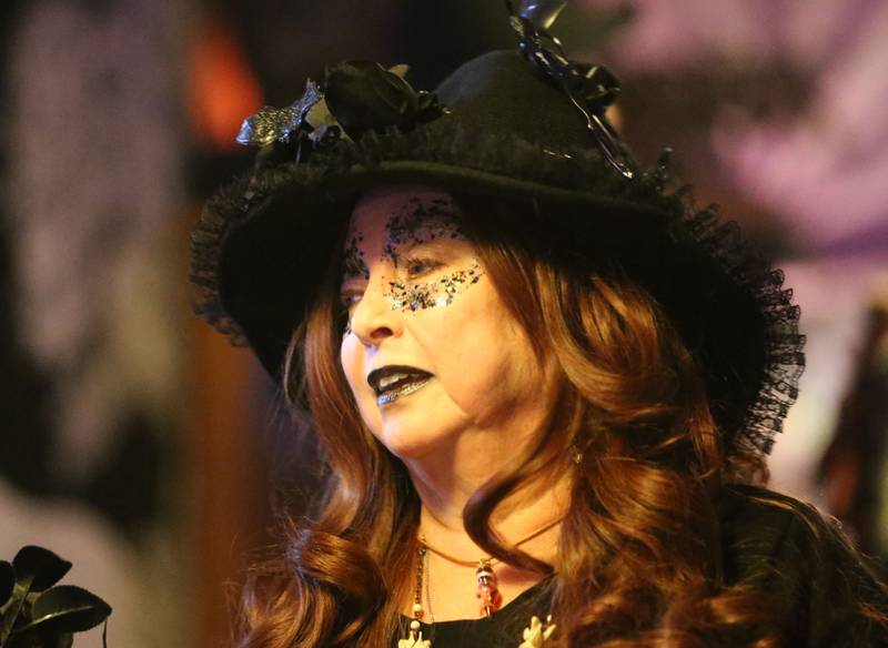 Dora Brooks of The Village Witches performs on Wednesday, April 30. 2025 at Crafty Eclectic in La Salle. The witches performed five dances as a part of a world wide witches dance to honor the original Wolfshager Hexenbrut, a meaning "The Wolf Hunter's Coven," a group of women from Germany known for the choreographed with dance. The witches also dedicated their performance to their friend RJ who passed away recently.