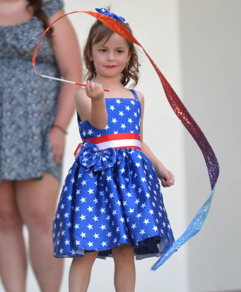 Lucy Skoumal, 4, performs with a ribbon during the talent portion of Let Freedom Ring's Little Miss and Mister Firecracker contest on Wednesday, July 2, 2025.
