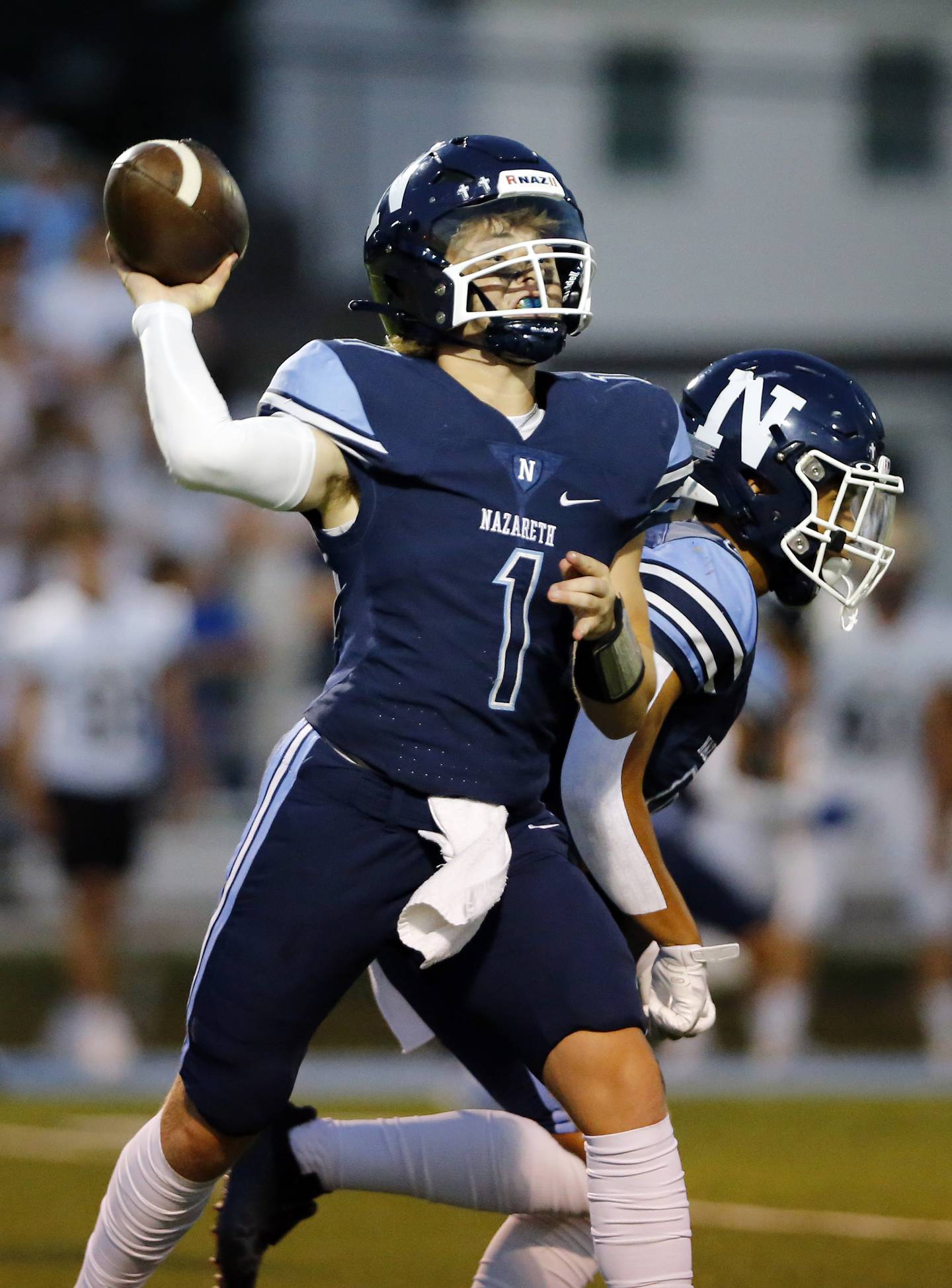 Nazareth Academy's Logan Malachuk (1) passes during the boys varsity football game between Lemont High School and Nazareth Academy on Friday, Sept. 2, 2022 in LaGrange, IL.
