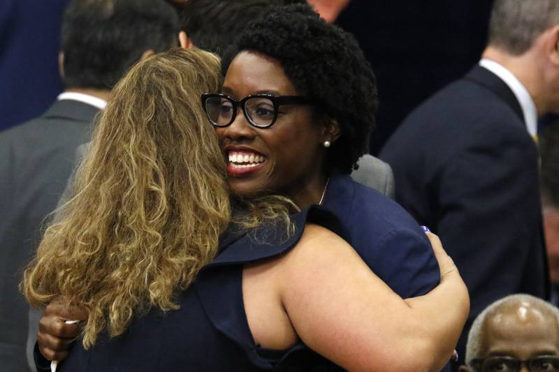 U.S. Rep Lauren Underwood, D-Naperville, meets with others in attendance waiting for President Joe Biden's visit to McHenry County College on Wednesday, July 7, 2021 in Crystal Lake.