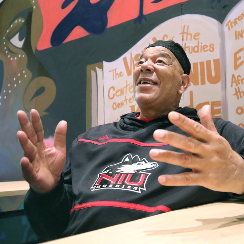 Derrick Smith, an academic counselor in the Center for Black Studies at Northern Illinois University and father of four, talks Tuesday, June 13, 2023, at the center, about what fatherhood has meant to him, how his own father helped change his life and how he feels like a father to the many students he mentors on campus at NIU.