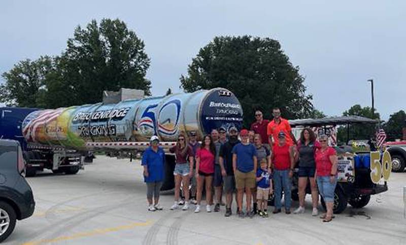 Breckenridge Trucking owners Dan and Susan Breckenridge with their children, founders Don and Karen Breckenridge, as well as a group of essential team members, friends and family.