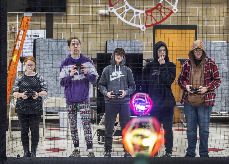 Members of Dixon High School’s drone soccer club Lillyonna Tranbarger, Christopher Wadsworth, Mason Schaefer, Sean Richter and Wyatt Alexander face off in a scrimmage Wednesday, Jan. 25, 2024 against a team from Reagan Middle School.