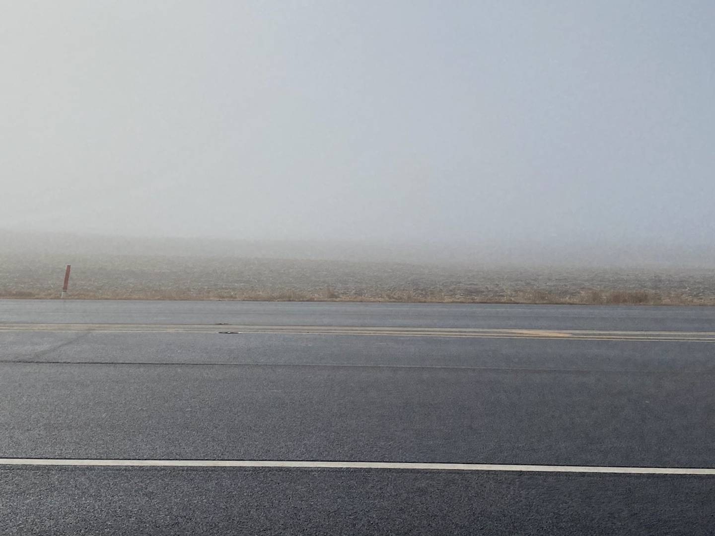 Visibility along Illinois Route 38 was limited Tuesday morning, as fog settled around DeKalb County obscuring sight for some motorists along many of the more rural roads. Seen here is Lincoln Highway headed west from Cortland into DeKalb Tuesday, Jan. 10, 2023.