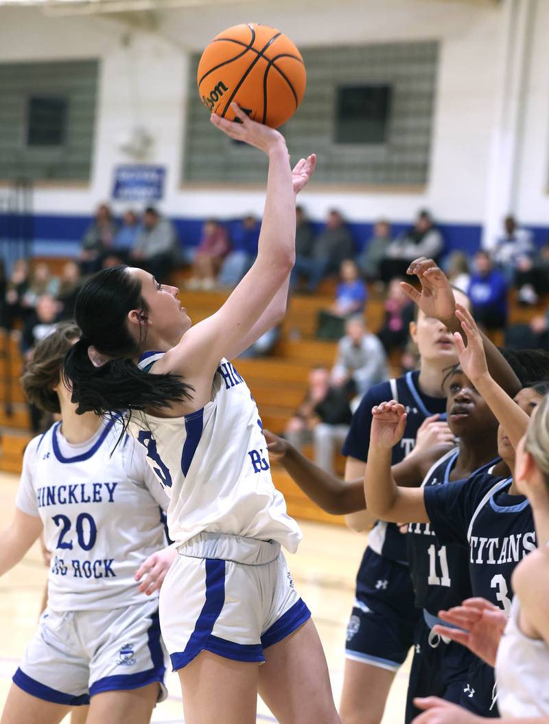 Hinckley-Big Rock's Mia Cotton shoots over a Illinois Math and Science Academy defender during their game Thursday, Jan. 8, 2025, at Hinckley-Big Rock High School.