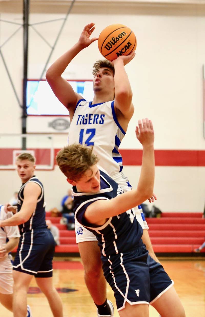 Princeton's Asa Gartin draws contact on a shot against Fieldcrest Tuesday night at Hall High School.
