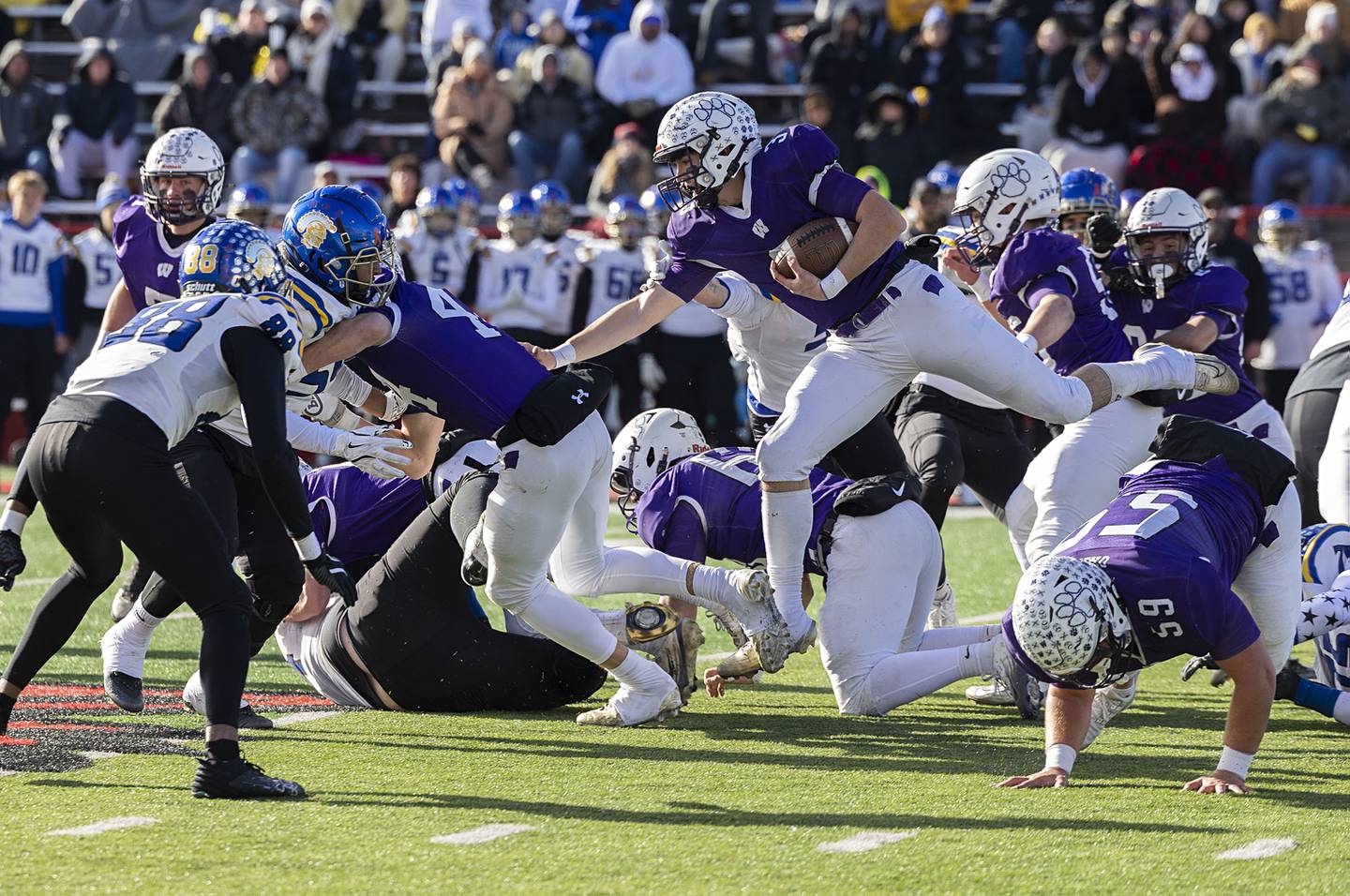 Wilmington's Ryan Kettman leaps over the pike against Maroa-Forsyth Friday, Nov. 28, 2025, in the Class 2A football finals at Hancock Stadium at ISU.