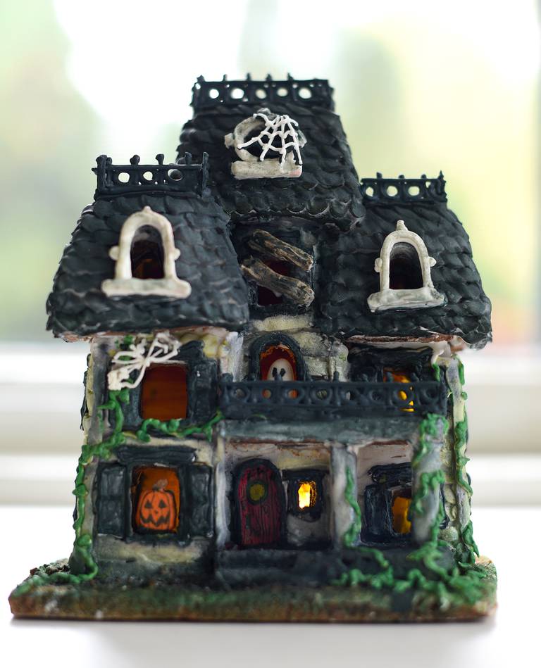 The fully dimensional haunted cookie house by Liz Suwanski of St. Charles has little lights on the inside.