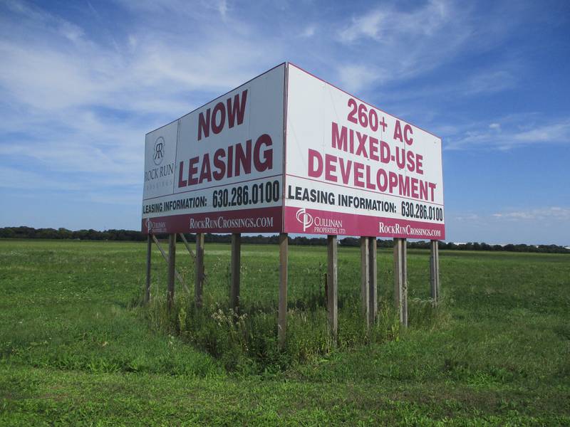 A sign along Interstate 55, seen on Aug. 14, 2021 advertises space for the future Rock Run Crossings development in Joliet.