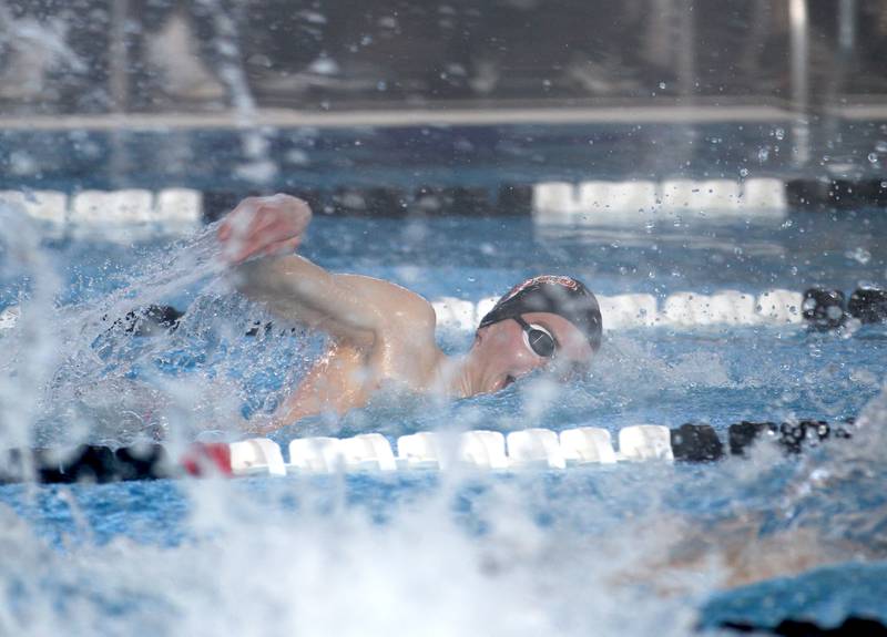 DeKalb’s Jacob Gramer competes in the consolation heat of the 100-yard freestyle during the IHSA Boys Swimming and Diving Championships at FMC Natatorium in Westmont on Saturday, Feb. 26. 2022.