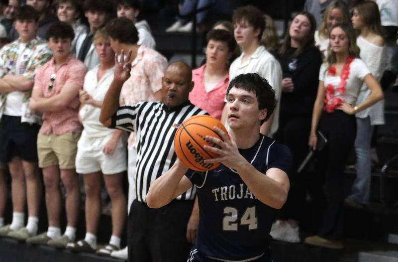 Cary-Grove’s Brady Bauer prepares to drain a three pointer in varsity boys basketball on Tuesday, Feb. 17, 2026, at McHenry High School in McHenry.