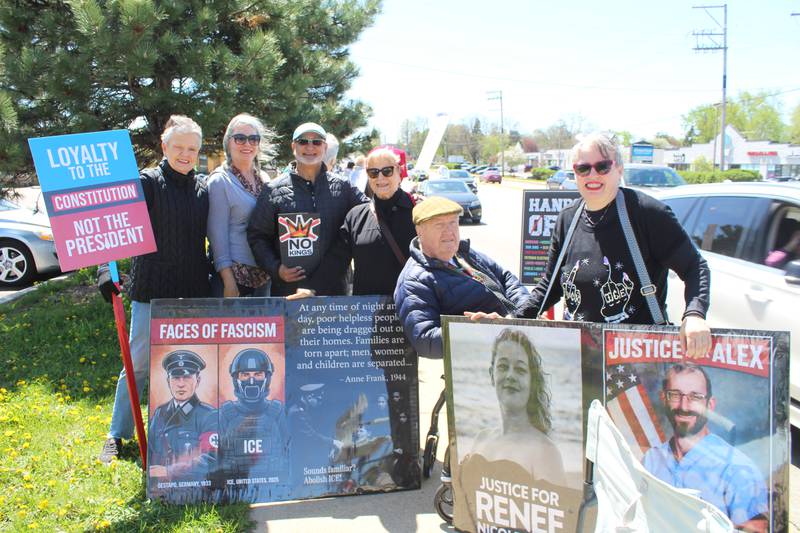 Democratic nominee for McHenry County Treasurer Amin Karim (third from left) attends the "Communities Not Cages" rally on April 25, 2026, in McHenry.