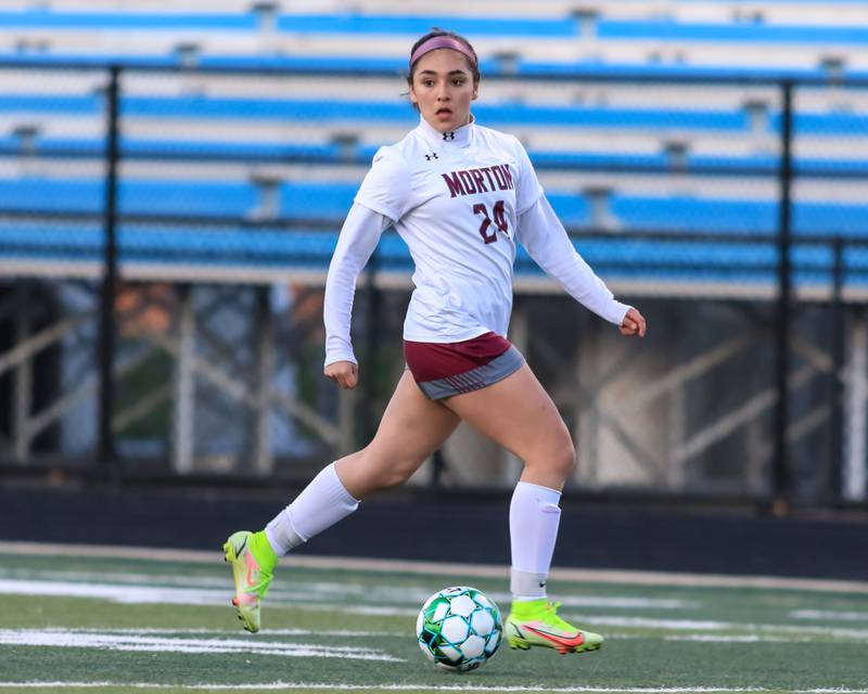 Morton's Aaliah Leanos (24) advances the ball during soccer match between Morton at Willowbrook. April 14, 2022.