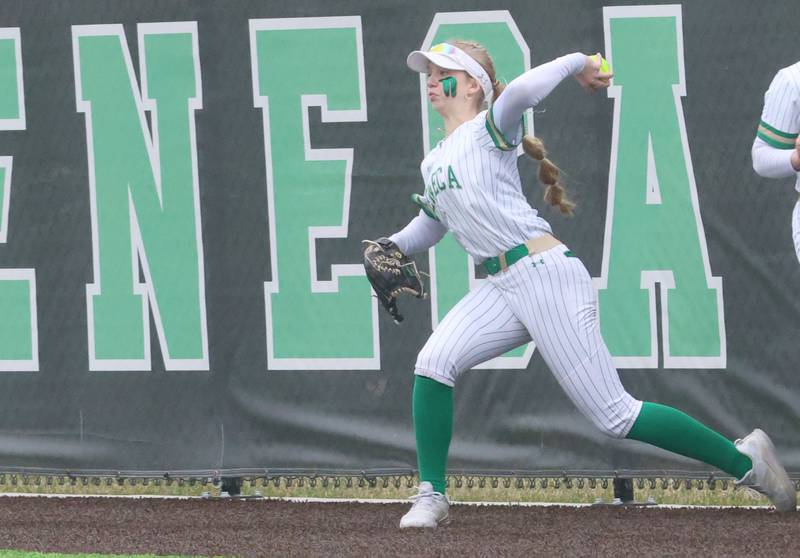 Seneca's Greysen Provance throws the ball back into the infield on the warning track on Thursday, March 12, 2026 at Seneca High School.