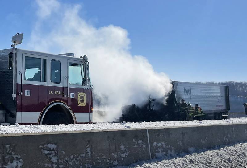 La Salle firefighters assist Oglesby Fire and EMS during a semi truck fire on the Interstate 39 Abraham Lincoln Memorial Bridge that crosses over the Illinois River between on La Salle and Oglesby on Monday Jan. 3, 2022.