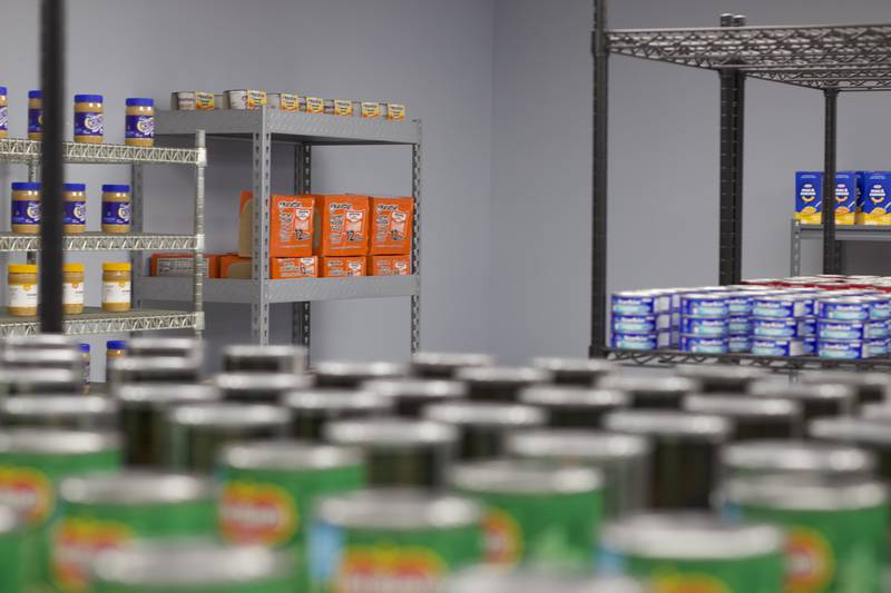 Shelves of canned food seen on Monday, April 21, 2025, at the Joliet Township Forest Park Community Center in Joliet.