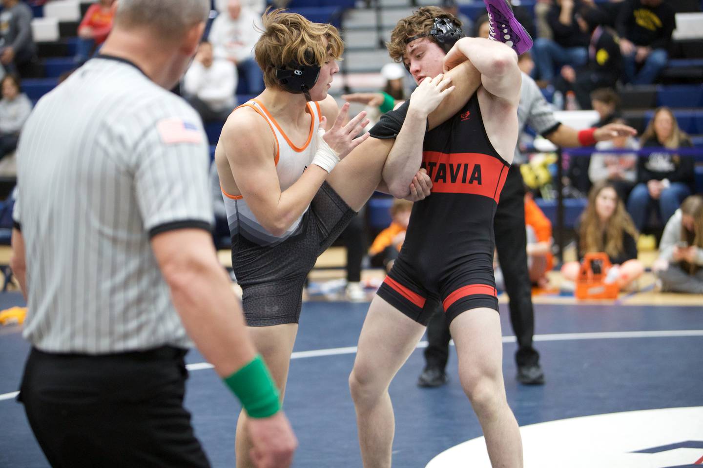 St. Charles East's Ben Davino  and Batavia's Aiden Huck compete in the 126 lb. Finals at the DuKane Wrestling Conference meet at Lake Park High School on Saturday, Jan.21,2023 in Roselle.