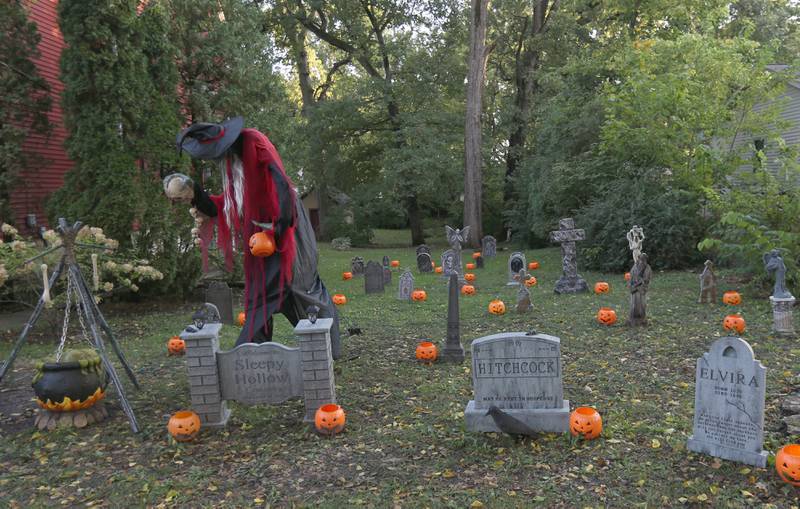 A large fake cemetery full of tombstones can be seen in the lawn of a home in the 800 block of Ottawa Avenue on Thursday, Oct. 12, 2023 in Ottawa.
