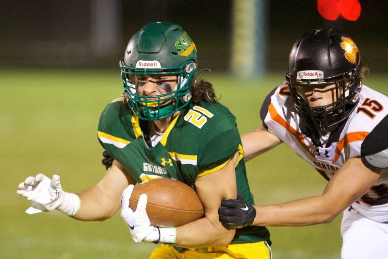 Crystal Lake South's Michael Prokos runs for a gain against Crystal Lake Central on Friday Sept.30,2022 in Crystal Lake.