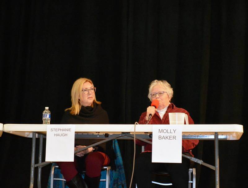 Oregon School District Board of Education candidate Stephane Haugh, of Mt. Morris, left, listens as fellow candidate Molly Baker, of Mt. Morris, speaks during the March 23, 2023, Candidates Night at Pinecrest Grove hosted by the Mt. Morris Economic Development Group. All candidates running for the Oregon School District Board of Education and for the Mt. Morris Village Board were invited.
