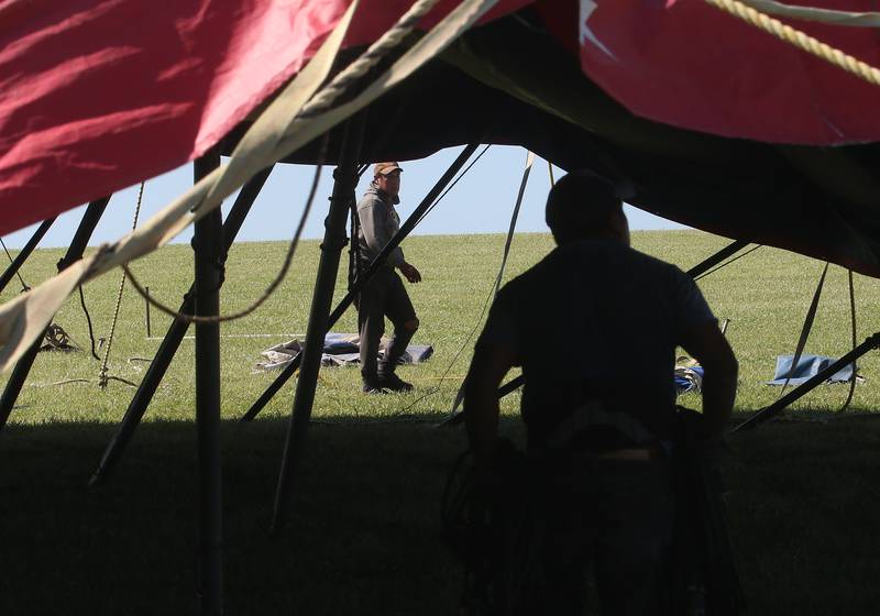 Crew members from the Culpepper & Merriweather Circus set up the "big top" tent on Monday, June 23, 2025 at Boggios in Granville.  The "big top" tent is 70 x 110 feet. It takes a crew of 12 men approximately two hours to set it up and 45 minutes to take it down. The tent stands 30 feet tall and utilizes 32 side poles, 16 quarter poles, two center poles, and 100 stakes. The circus held two shows and was sponsored by the Village of Granville and Boggio's Orchard & Produce, LLC