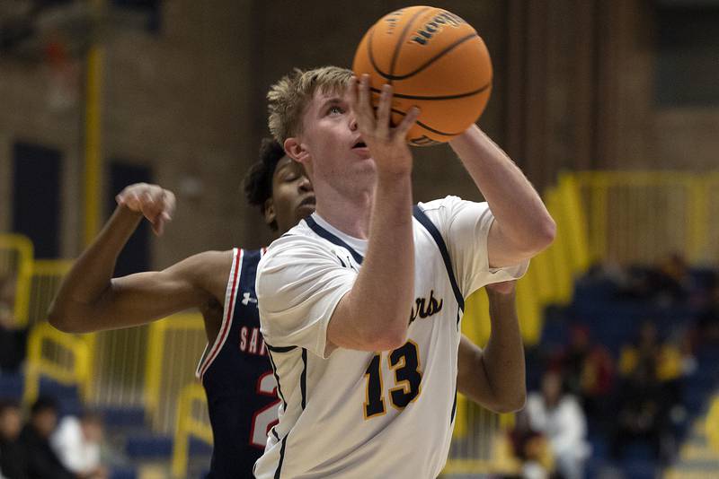 Sterling’s Will Ports puts up a shot against St. Viator Monday, Jan. 20, 2025, during Sterling’s MLK Classic.