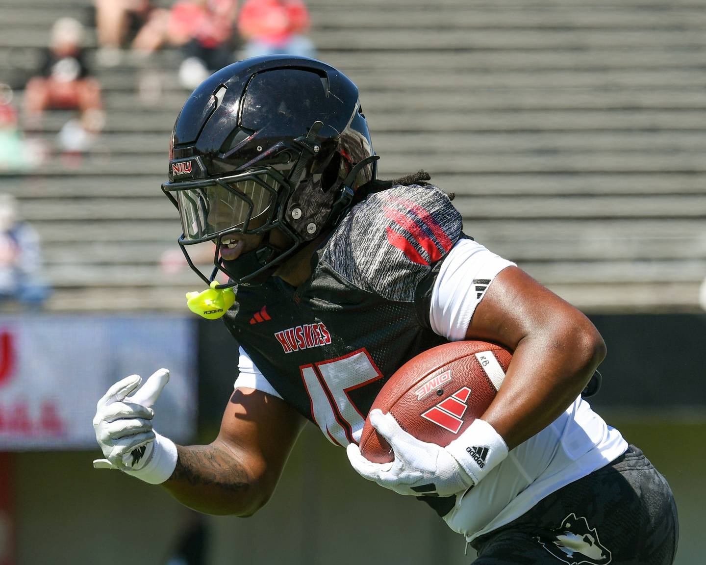 Northern Illinois University's running back Telly Johnson Jr. (45) runs some drills during warmups on Saturday, April 25, 2026, before the start of the spring football scrimmage held at Huskie Stadium in DeKalb.