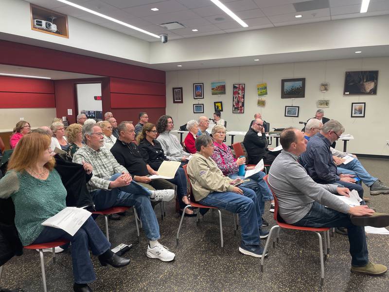 A crowd appears at the city of DeKalb's Planning and Zoning Commission meeting Monday, March 4, 2024, at the DeKalb Public Library, 309 Oak St. The Commission gave favorable reaction to a proposal which could see a local developer build more than 220 units for senior living in DeKalb. Residents voiced both support and opposition to the plan.