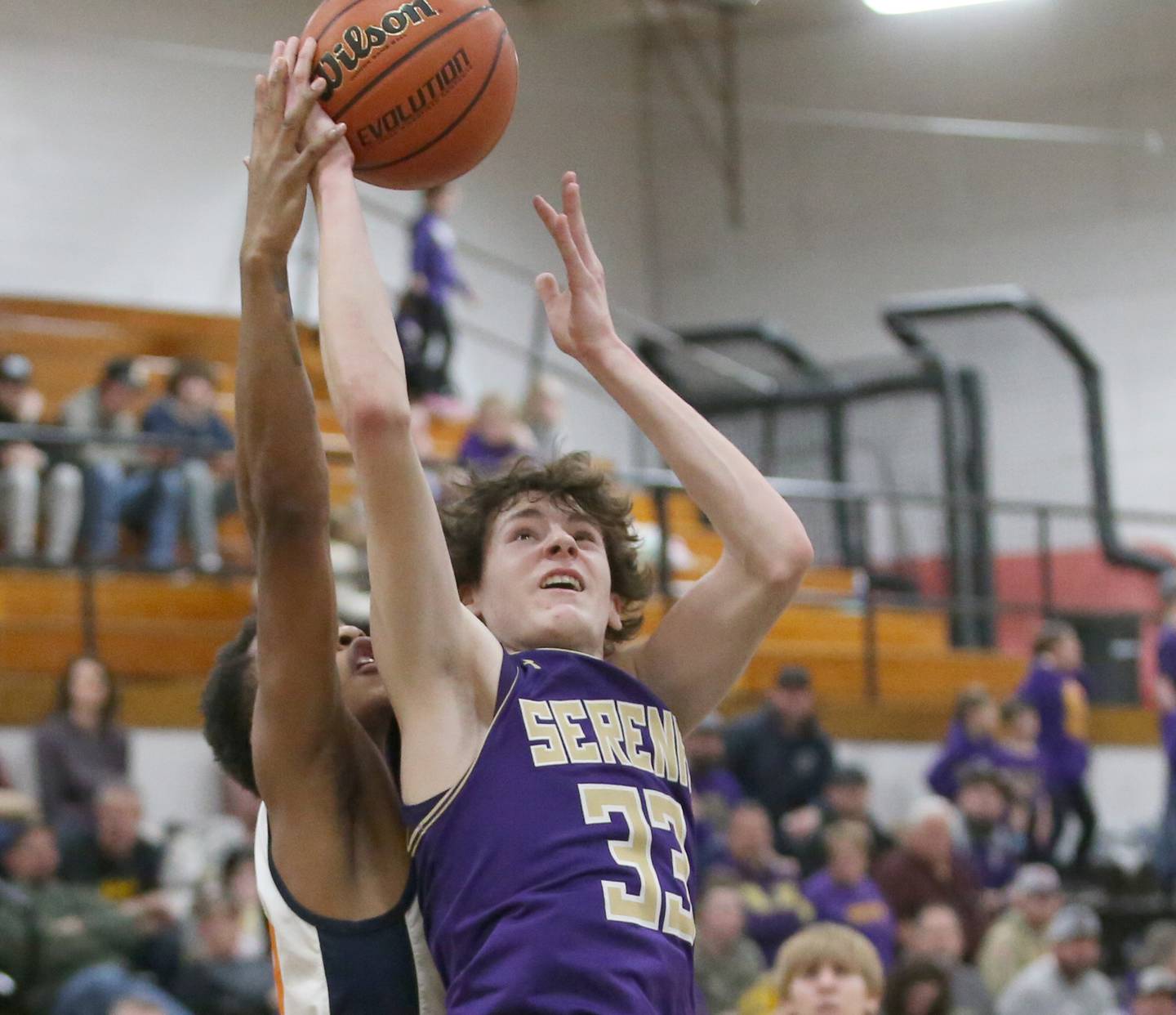 Serena's Hunter Staton runs in front of Ellison's Terrell Richardson to score a basket during the Class 1A Sectional semifinal on Tuesday, Feb. 28, 2023 at Putnam County High School.