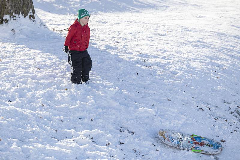 Maverick Swan, 4, looks for help Sunday, Nov. 30, 2025, as his sled made the descent solo at EC Smith Park in Dixon.