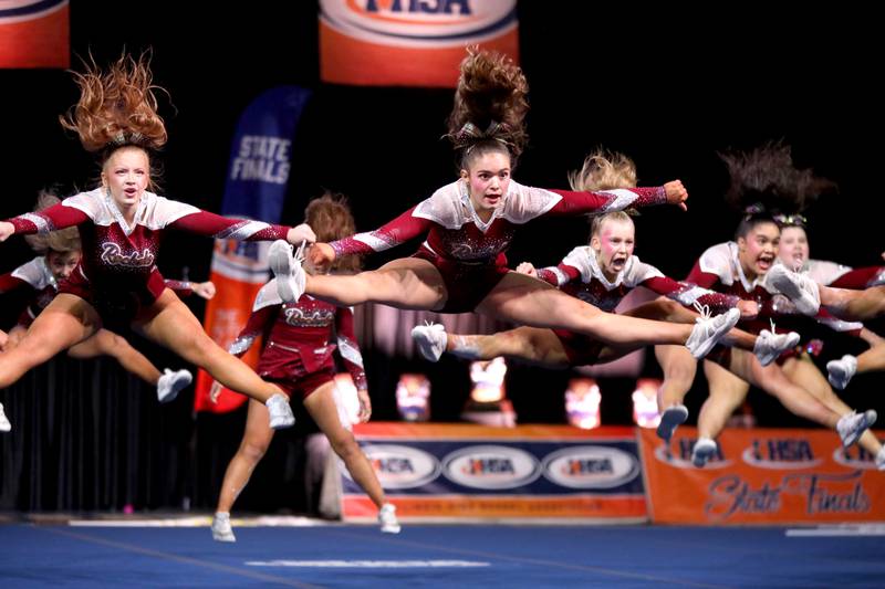 Members of the Richmond-Burton cheerleading team compete in the small team division of the IHSA State Finals on Saturday, Feb. 8, 2025 at Grossinger Motors Arena in Bloomington.