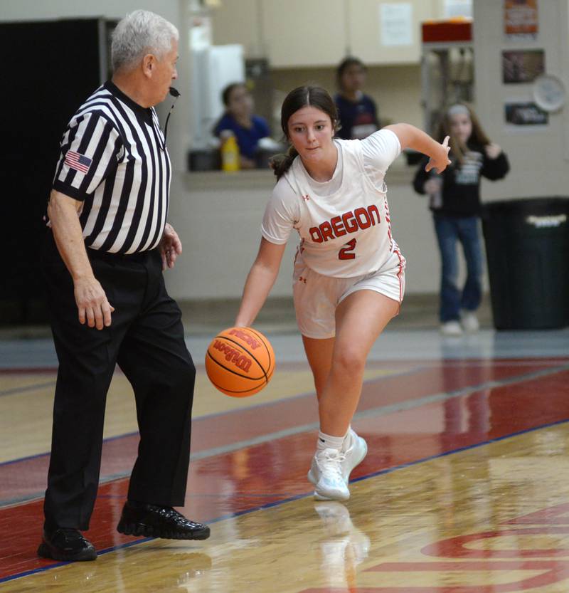 Oregon's Avery Kitzmiller (2) dribbles up the sideline against West Carroll at the Oregon Girls Basketball Tip-Off Tournament on Wednesday, Nov. 20, 2024 at the Blackhawk Center in Oregon.