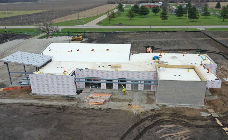 An aerial view of the Dr. Alfred E. Wisgoski Agricultural Education Center on Wednesday, April 1, 2026, at Illinois Valley Community College in Oglesby. Crews have begun construction on the exterior walls. The new facility is expected to redefine IVCC’s agriculture program, equipping the college to train and upskill agricultural workers, support the development of new technologies and promote sustainable practices.
Approximately $1.6 million has been pledged toward the agricultural center, and IVCC plans to launch a community donation program later this spring. The 10,250-square-foot building is slated for occupancy in 2027.
The project is supported by a $3.5 million grant from the U.S. Department of Economic Development Administration, a $240,000 grant from the Illinois Department of Commerce and Economic Opportunity and a $1 million gift from the Wisgoski family.