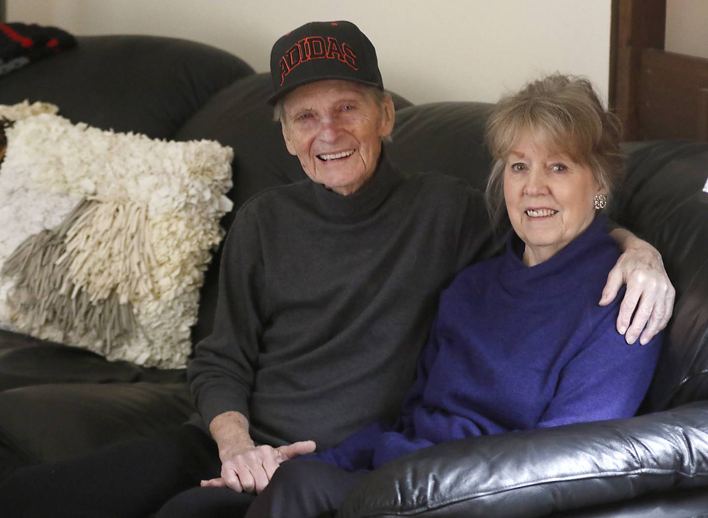 George Diedrichs, a local runner who just celebrated his 90h birthday, with his wife, Flo, as their home in Crystal Lake on Thursday, Jan. 5, 2023.