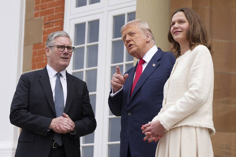 President Donald Trump meets with Britain's Prime Minister Keir Starmer, left, and his wife Victoria Starmer at Trump Turnberry golf club on Monday, July 28, 2025 in Turnberry, Scotland. (Christopher Furlong/Pool Photo via AP)