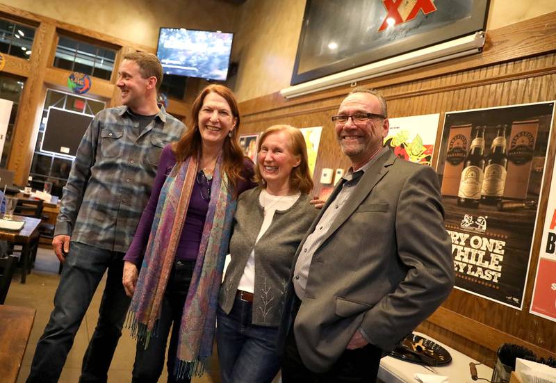 (Left to right) Campton Hills trustee candidates Nicolas Boatner and Janet Burson, village president candidate Barbara Wojnicki and trustee candidate Timothy Morgan celebrate early returns in the Consolidated Election on Tuesday, April 4, 2023.