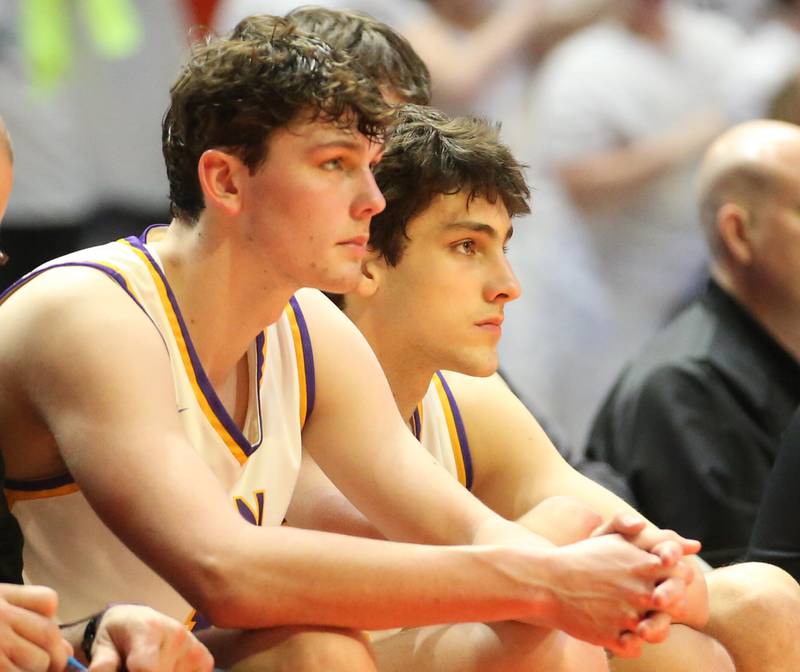 Downers Grove North's Jake Riemer and teammate Finn Kramper watch the final seconds of the game against Moline during the Class 4A state semifinal game on Friday, March 10, 2023 in Champaign.
