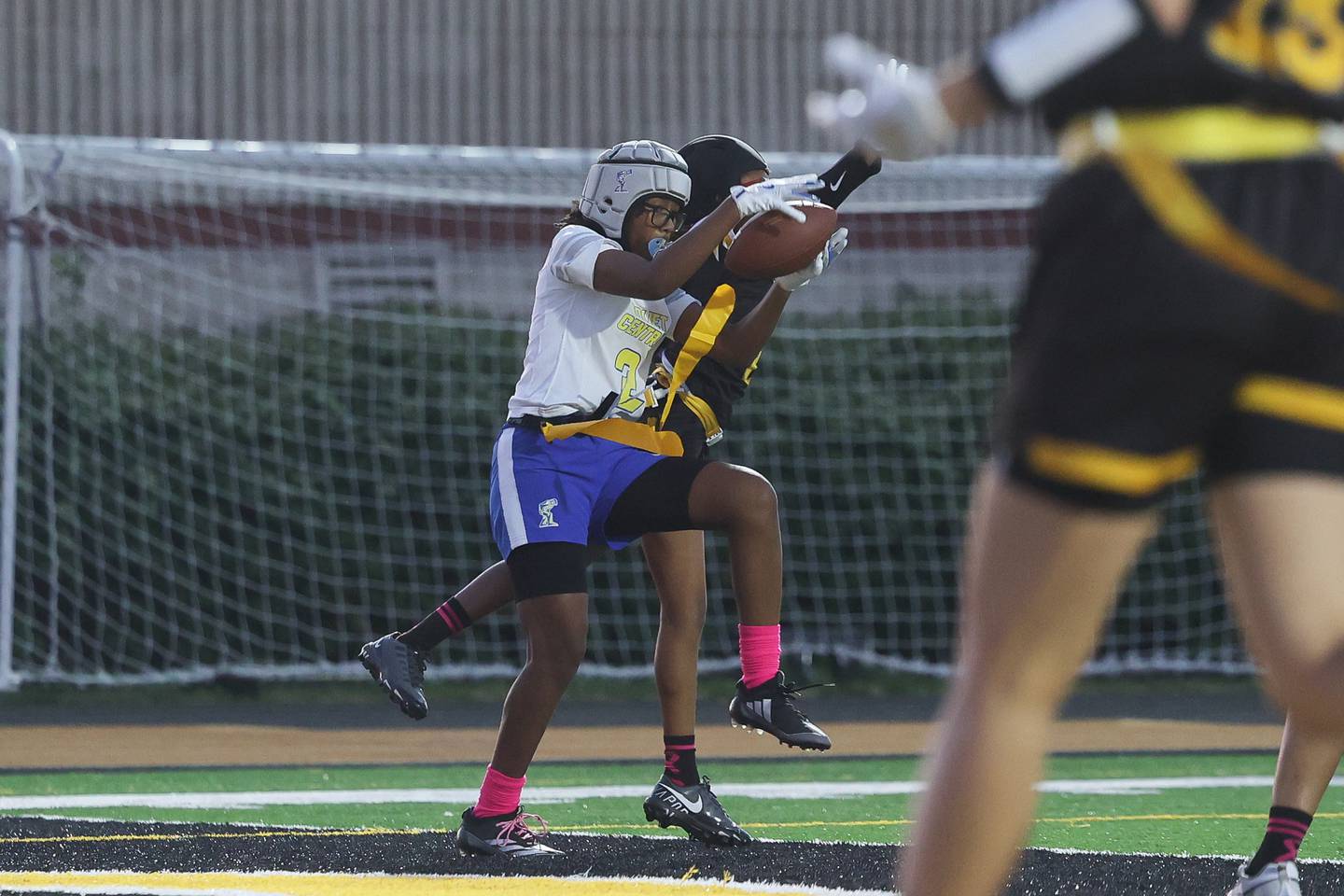 Joliet Central’s Ta’Niya Banks pulls in a pass for a touchdown against Joliet West on Wednesday, Oct. 2, 2024 in Joliet.