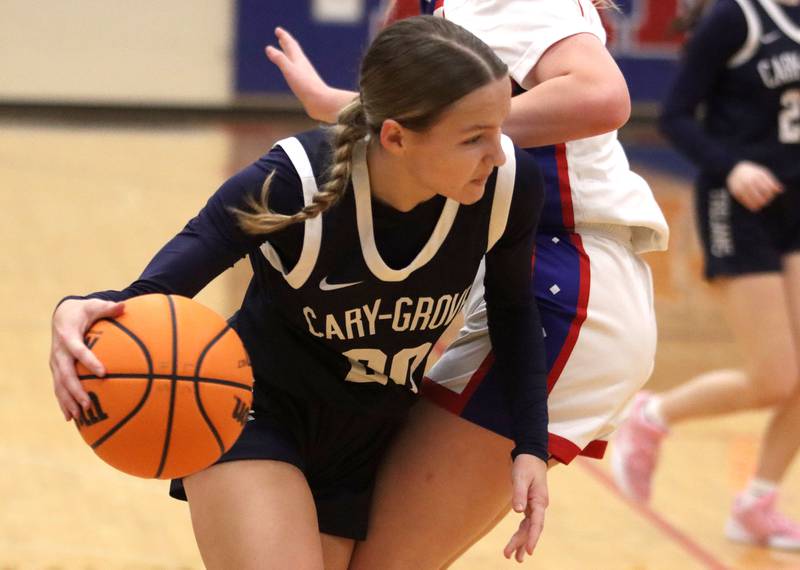 Cary-Grove’s Ava Santucci moves the ball against Lakes  in varsity girls basketball action on Friday, Jan. 2, 2026  at Lakes High School in Lake Villa.