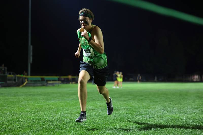 Bishop McNamara's Oliver Heinrich cross the finish line during the All-City cross country meet at Bishop McNamara on Wednesday, Sept. 17, 2025.