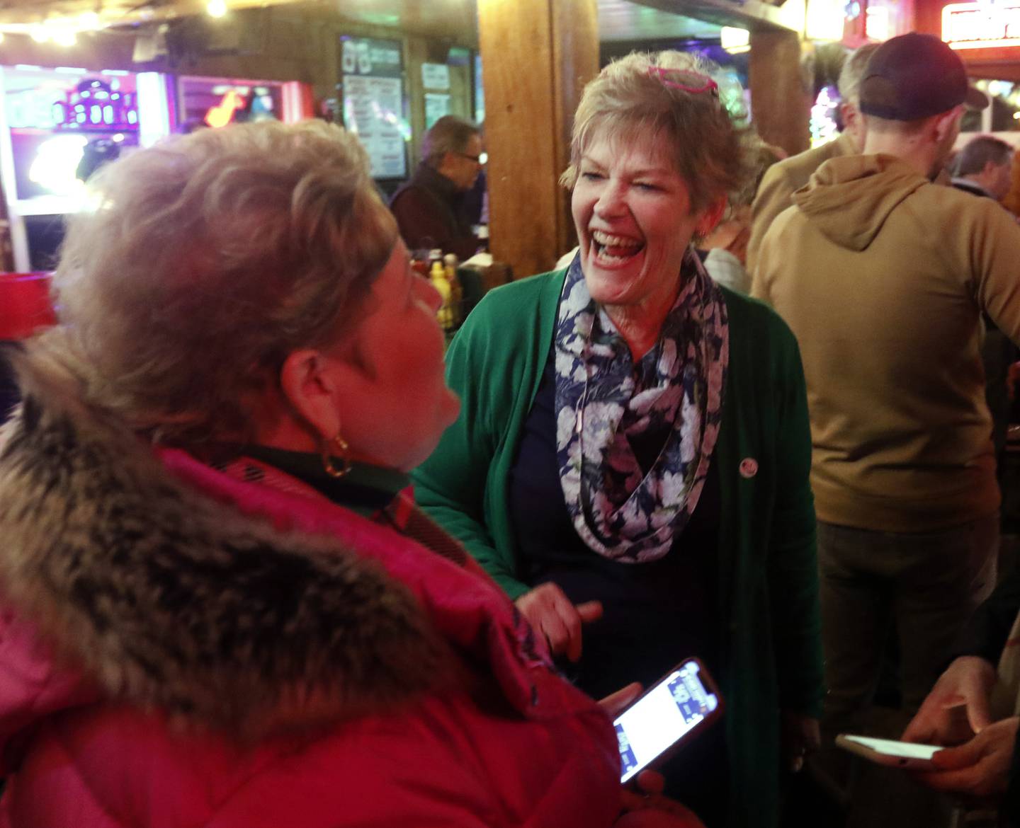 Crystal Lake's City Council candidate Ellen Brady laughs as she talks with people during an election watch party for Crystal Lake Mayor Haig Haleblian and candidates for Crystal Lake's City Council at the Cottage Tuesday, April 4, 2023, in Crystal Lake.